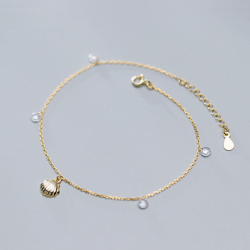 Armband met schelp en diamantjes