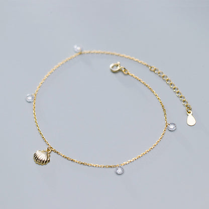 Armband met schelp en diamantjes