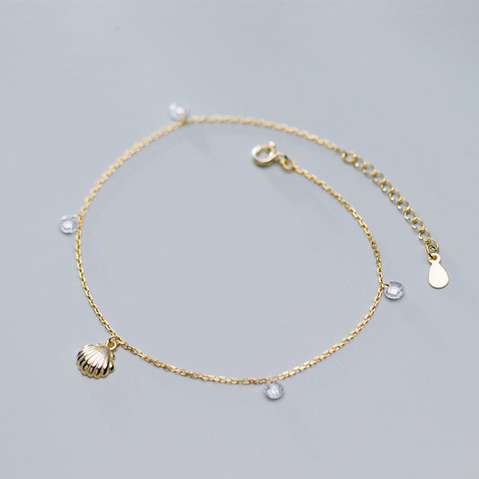 Armband met schelp en diamantjes