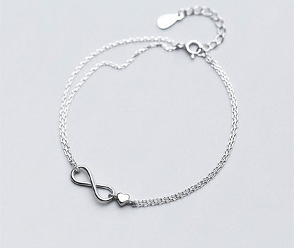 Infinity armband met klein hartje