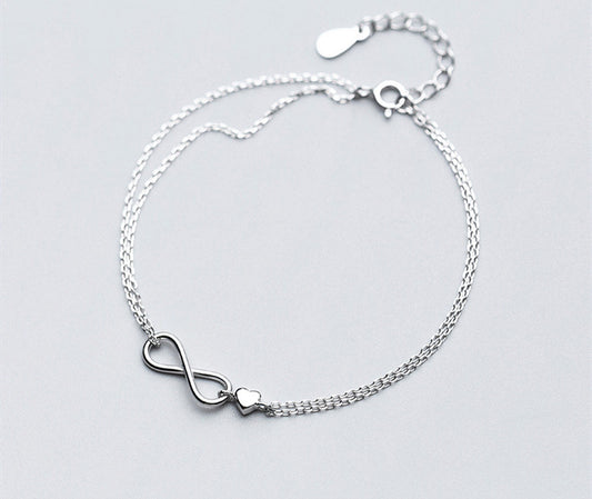 Infinity armband met klein hartje