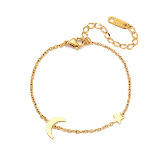 Gouden armband met een maantje en ster